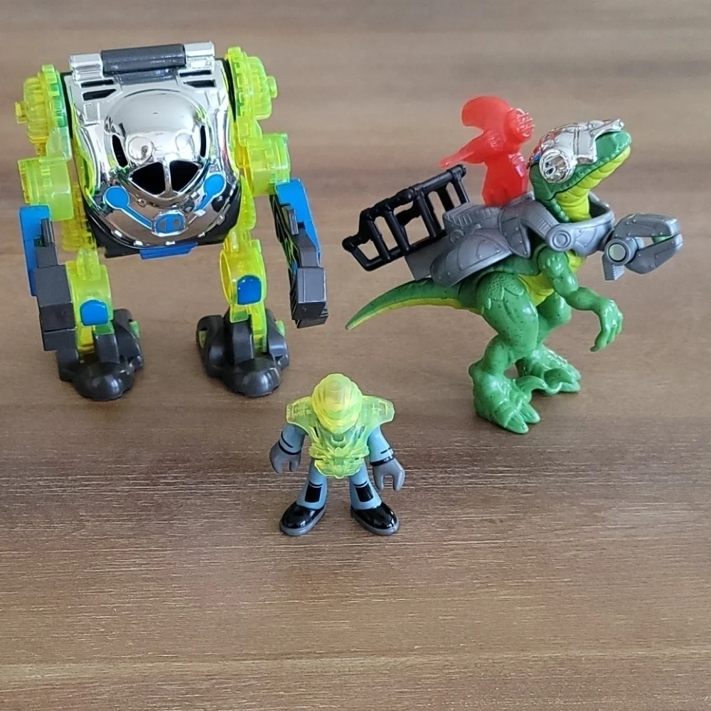 Fisher-Price Imaginext Raptor Doc & Exo Suit Dinosaur Figure Toy Set